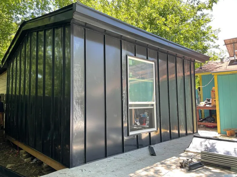 Black standing seam metal wall panels for Roof Inspection in Northdale