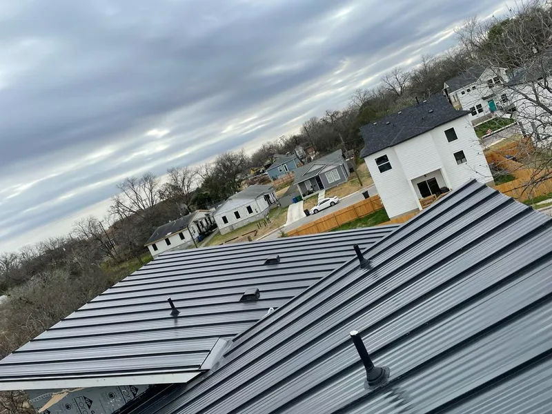 Standing seam metal roof panels with vents for Skylight Repair in Northdale